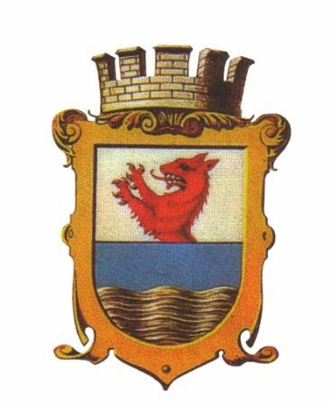 Wappen der Stadtgemeinde Amstetten mit Goldenen Wellen, blauem Untergrund und rotem Wolf mit goldenem Rahmen und Krone aus Mauersteinen.